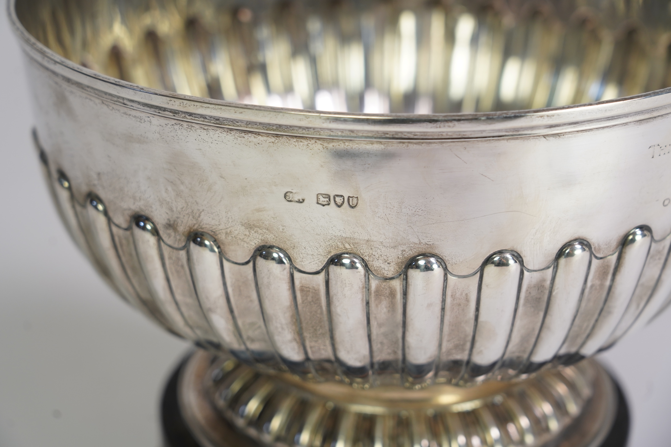 A late Victorian demi-fluted silver presentation punch bowl, by Sibray, Hall & Co
